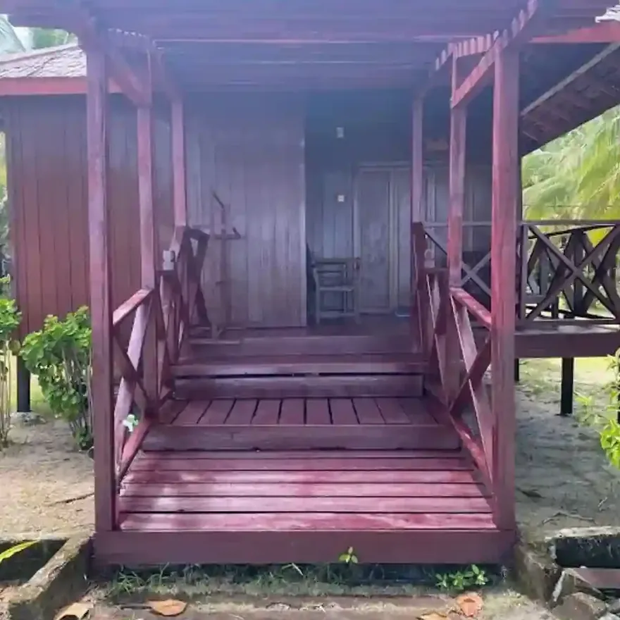 Porch of a timber beach villa at Maratua Paradise Resort